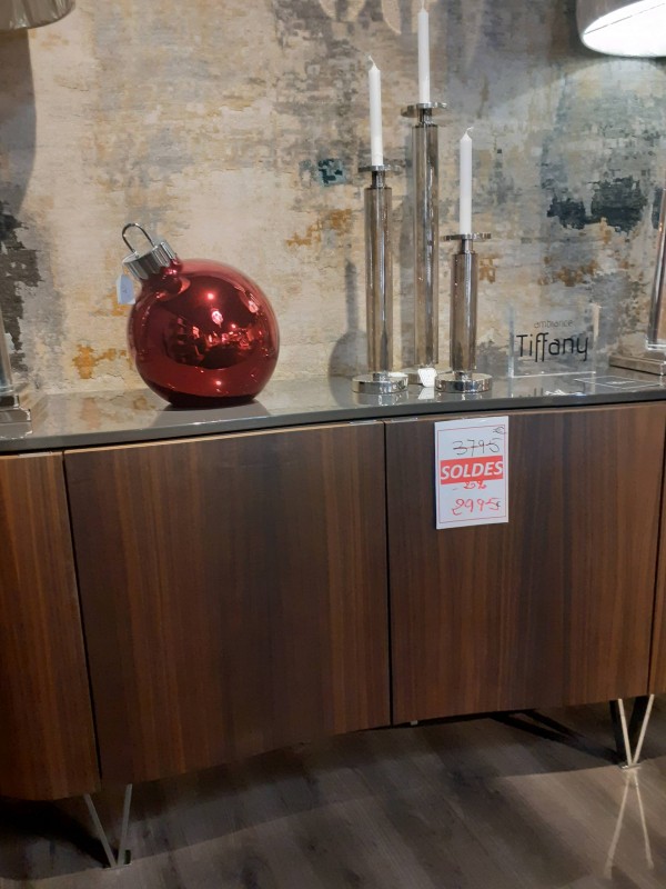 Fauteuil Stressless en cuir beige.